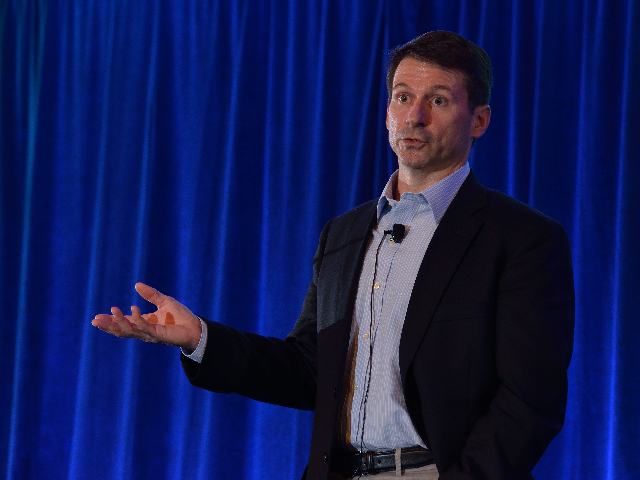Derek Boudreau, managing director of operations for John Deere Co. in Russia, speaking at the 2014 DTN/The Progressive Farmer Ag Summit in Chicago. (DTN/The Progressive Farmer photo by Jim Patrico)