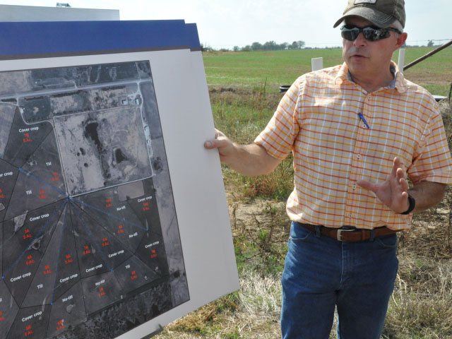 Jim Rogers, a pasture and range specialist at the Noble Foundation, talks about different cropping practices used for winter wheat in paddocks on one of Nobleâ€™s research farms. The farm has been studying tillage, no-till, cover crops and comparing yields from those various practices. (DTN photo by Chris Clayton) 