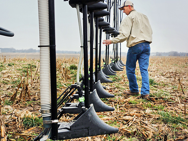 Dan Sutton outfitted a Hagie sprayer with drop nozzles that can apply fungicides and nitrogen simultaneously. See "Make Your Machine Multipurpose" for details. (Progressive Farmer photo by Dave Tonge)