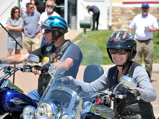 Iowa Sen. Joni Ernst (right) and her husband, Gail, (left) participated in Ernst&#039;s third "roast and ride" fundraising motorcycle ride for veterans on Saturday from Des Moines to Boone. (DTN photo by Chris Clayton)