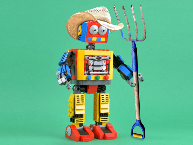 News stories about robots in the livestock industry beg an interesting question about the accelerating mechanization of agriculture and what it means for the ever-shrinking population and vitality of rural America. (Robot photo by Brickset, CC BY 2.0; DTN photo illustration by Nick Scalise)