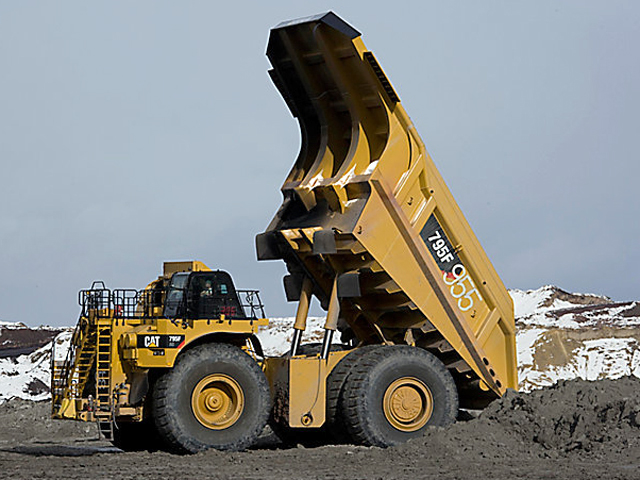USDA will be dumping a truckload of livestock data this week and next week. (Photo courtesy of Caterpillar)