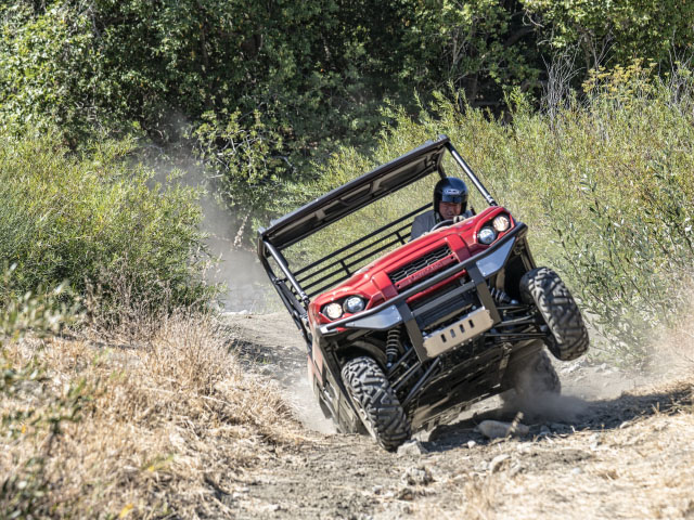 The author goes flat out to test the new PRO MULE-FXR's handling in rough terrain. (Photo courtesy of Douglas Henry/Kawasaki)