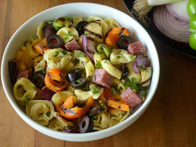 While the grill is still hot, throw on a bunch of vegetables to toss in salads. Chop them into larger pieces so they wonâ€™t fall through the grates, and make sure your grill is clean and oiled for great char marks. (Photo by Rachel Johnson)