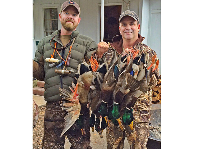 Stewart Robinson (left) helped Cameron Dinkins transition Esperanza Outdoors from a hunting club to a waterfowl guiding service. (Progressive Farmer photo by Linden Plantation)