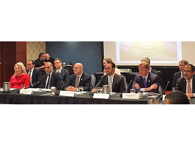 The complete Commodity Futures Trading Commission listens as members of the agricultural advisory committee make presentations at a meeting in Overland Park, Kansas. From left, Commissioner Dawn Stump; Commissioner Rostin Behnam; Chairman Christopher Giancarlo; Charlie Thornton, director of the Office of Legislative and Intergovernmental Affairs; Commissioner Brian Quintenz; and Commissioner Dan Berkovitz. (Photo by Jerry Hagstrom for DTN)