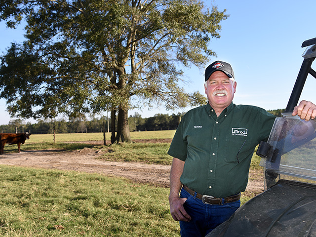 Tommy Mead hopes a premium Red Baldy program will add value to his Hereford-Angus cross herd. (Progressive Farmer image by Becky Mills)