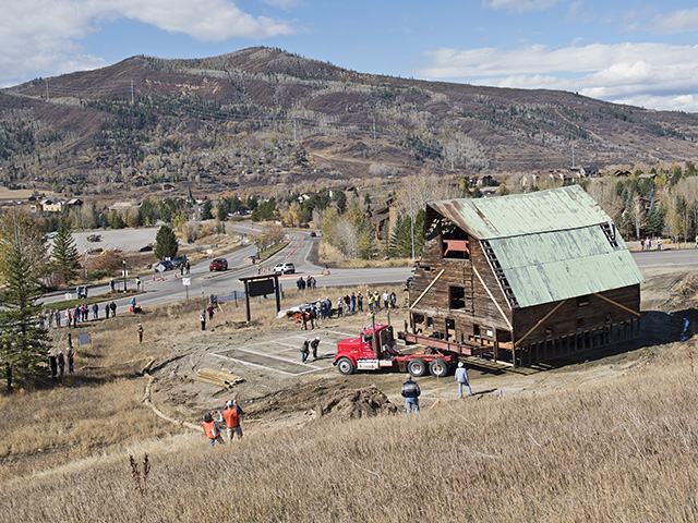 Glenn Arnold grew up helping on a family dairy in the Rocky Mountains. The barn his father built in 1928 was at the center of that life and, now, has been saved by a ride up the road, Image by Joel Reichenberger 