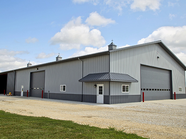 The overhead door of the Vahlesâ€™ shop is 32 feet wide and 16 feet high, Image by Ted Schurter