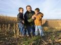 Kevin Ross with twin sons carver (left) and Hollis, Image by Greg Lamp