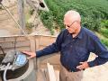As part of the Arkansas Discover Farm program, Steve Stevens monitors water quality runoff, which helps him limit nutrient and soil loss, Image by Charles Johnson