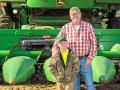 Dan Gause (with son Daniel) gives precision farming the credit for boosting his whole-farm dryland corn averages by 60 bushels to the acre, Image by Fred Salley