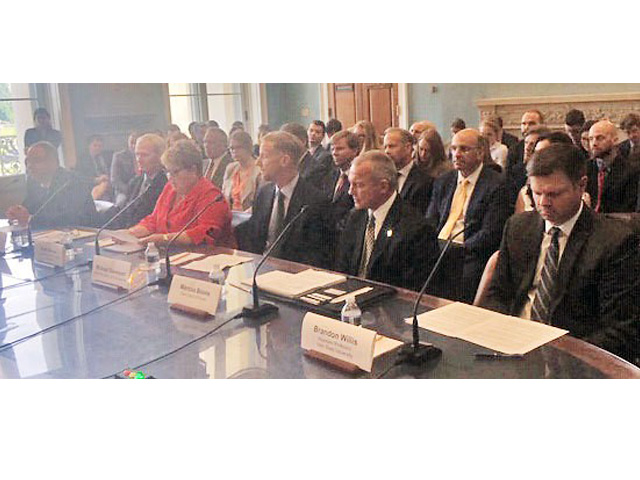 Testifying before a House Agriculture subcommittee today, from left, Bradley Lubben of the University of Nebraska-Lincoln; Leo Ettleman, a farmer from Sidney, Iowa; Ruth Gerdes, a crop insurance agent from Auburn, Neb.; Michael Davenport, chairman of the American Association of Crop Insurers; Marcus Boone of the Farm Credit of Florida; and Brandon Willis of Utah State University. (Jerry Hagstrom/The Hagstrom Report)