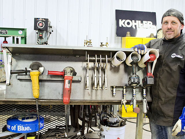 This wall-mounted tool rack costs about $125 in materials. It can hold power tools, clamps and custom fittings to store air tools, Image by Dan Miller