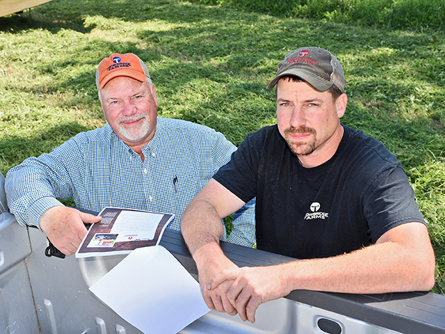 Phil (left) and P.J. Trowbridge of Trowbridge Farms market about 100 bulls and 50 cows and heifers at their annual sales. (Progressive Farmer image by Becky Mills)