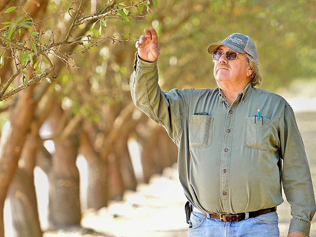 Tom Rogers farms in a place where production is impossible without a careful application of irrigation water, Image by Jim Patrico