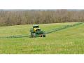  Turns on hilly ground can cause a spray boom to sway, putting one end in the air and the other on the ground. Results: poor coverage and possible drift, Image by Jim Patrico