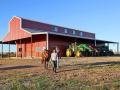 Brit and Brady Russell are part of trend of creating permanent living spaces in active barns, Image by Karl Wolfshohl