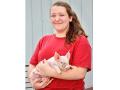 Shelby Schmitt, an animal science major at Purdue University, worked with sows and piglets as an intern for Legan Livestock and Grain, Coatesville, Indiana, Image by Des Keller