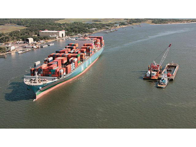 Aerial of dredging amid traffic on St. Johns in January 2019. USACE Jacksonville District is currently increasing the depth of the existing federal channel along the St. Johns River from its current depth of 40 feet to a maximum depth of 50 feet. Deepening the existing channel will allow for larger vessels, also referred to as Post Panamax, to access the channel. (Photo courtesy Mark Bias, USACE)