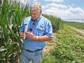 Perry Galloway, of Gregory, Arkansas, counts ear rows and kernels. (Progressive Farmer image by David Bennett)