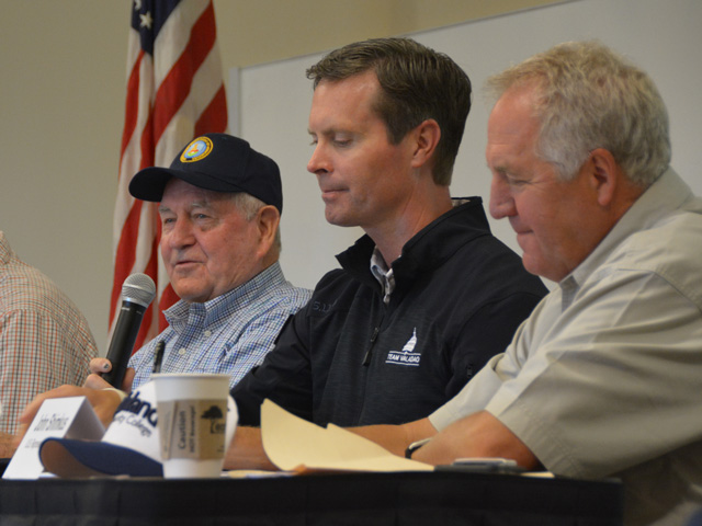 Agriculture Secretary Sonny Perdue answers a question at a listening session during the Farm Progress Show outside of Decatur, Illinois, on Wednesday. With Perdue were GOP Reps. Rodney Davis (center) and John Shimkus, both of Illinois. Fellow Illinois Reps. Mike Bost and Darin LaHood, also attended. (DTN photo by Chris Clayton)