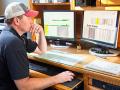 Shane Sand tracks costs, such as land, loans, repairs, grain storage, freight and drying, with a master Excel sheet. (Progressive Farmer image by John Borge)