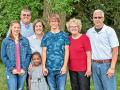 Four generations of Landuyts have farmed in Minnesota, including (left to right) Hallie, Mike, Kari, Harper (front), Hayden, Kris and George. (Progressive Farmer image Courtesy of NCBA Environmental Stewardship Award Program)