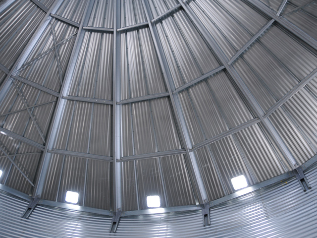 There is little farmers can do this spring to prevent grain-quality problems in their bins. They should check the grain every week, monitor it for odors, take moisture samples off the top and stay out of their bins. (DTN/Progressive Farmer file photo)