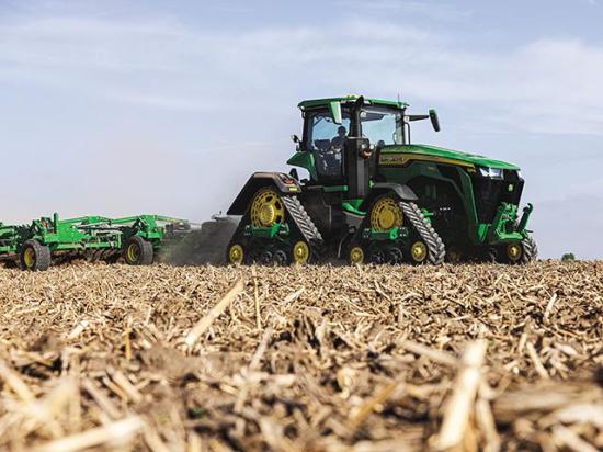 While Deere is still climbing out of its machinery sales slump, it has brought back 140 laid-off employees to its Waterloo, Iowa, Tractor Operations facility to fill an uptick in tractor sales, such as its new High Horsepower 8R and 8RX tractors. (Photo courtesy of John Deere)