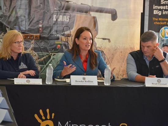 Agriculture Secretary Brooke Rollins talks to Minnesota corn farmers about USDA data collection and crop reports during a panel discussion at Farmfest on Tuesday. U.S. Reps. Michelle Fischbach and Brad Finstad, both Minnesota Republicans, also joined Rollins at the forum. Rollins later announced some crop insurance updates as well. (DTN photo by Chris Clayton)