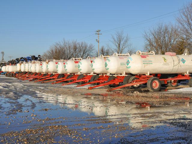 Anhydrous ammonia tanks wait for farmers to apply nitrogen fertilizer. U.S. fertilizer imports in 2025 declined dramatically as the year progressed, according to The Fertilizer Institute (TFI). (DTN file photo by Russ Quinn)