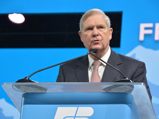 Agriculture Secretary Tom Vilsack speaks Monday at the American Farm Bureau Federation annual meeting in Salt Lake City. Vilsack continues to call on Congress to find more creative ways to craft a farm bill, including using the Commodity Credit Corp. funds given to USDA each year. (DTN photo by Chris Clayton)