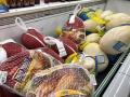 Turkeys at a grocery store in Omaha. The American Farm Bureau Federation shows a 16% decline in turkey prices for its annual survey of Thanksgiving meal costs. An overall Thanksgiving meal is about 5% cheaper than last year, unless other certain items are included such as ham. (DTN file photo by Elaine Shein)   