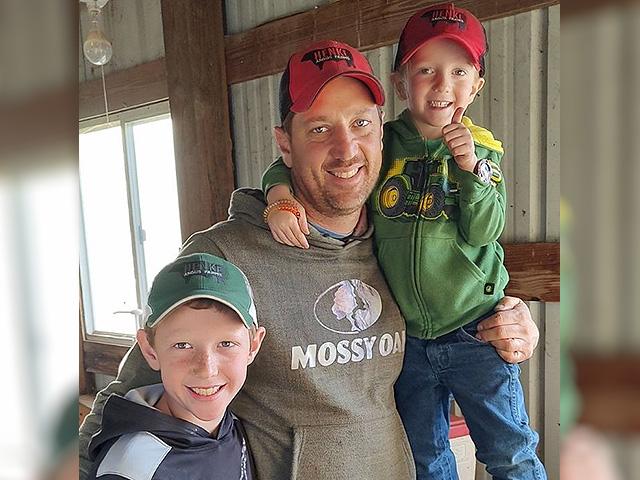 Chariton County, Missouri, farmer Charles Henke is considering what his farm&#039;s future may be as a power transmission project that is slated to begin construction next year. Pictured are Henke&#039;s son Byron, left, and Bennett, right. (Photo courtesy Charles Henke)