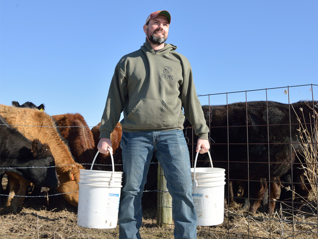 Aaron White sees similarities between farming and the military: working outdoors and making decisions. (PF photo by Jim Patrico)