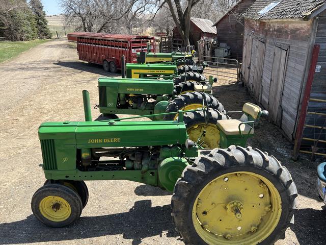 Some of the two-cylinder John Deere tractors on the Quinn farm. This photo was taken in April of 2022. (DTN photo by Russ Quinn)