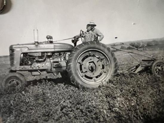 Russ Quinn&#039;s grandpa, John B. "Jack" Quinn, and Jack&#039;s son (Russ&#039; uncle), James V. Quinn, were photographed in spring 1951 on Russ&#039; grandma&#039;s 1945 Farmall M, plowing the family farm east of Elkhorn, Nebraska. Among the vintage iron Russ would like in his shed is this long-lost tractor. (Photo courtesy of Russ Quinn)