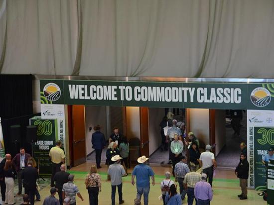 Farmers walk into the expo hall at Commodity Classic on Wednesday in San Antonio. Farmer leaders say they have had some frustrating talks with input suppliers over the costs of equipment, fertilizer and chemicals as input prices remain high while commodity prices remain low. (DTN photo by Chris Clayton)