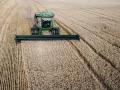 A farmer harvesting wheat earlier this summer. High diesel prices sparked the Trump administration to announce a new $8 billion aid program for farmers. Some groups praised the president for the aid, while calling for long-term policy changes. Other groups criticized the administration's policies for driving up fuel prices. (DTN file photo by EllaMae Reiff)