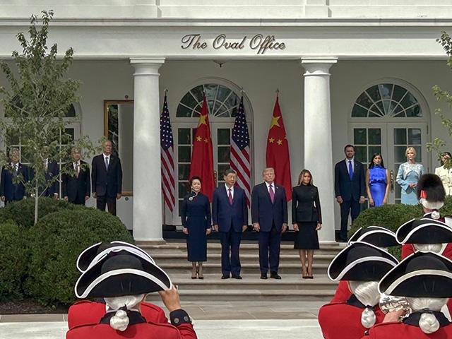 Chinese President Xi Jinping and U.S. President Donald Trump stand next to their wives, Madame Peng Liyuan and Melania Trump, at the White House last Thursday. The U.S. and China identified 1,600 products for potential tariff reductions but left implementation unresolved. (Photo by Jake Zajkowski)