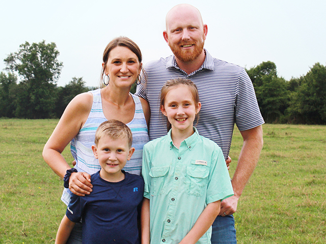 Dana and Joshua Stewart, and their children, Henry and Jewel, planned around the fair season annually, bringing their home-raised goats, sheep and cattle to compete. (Progressive Farmer image by Jessica Wesson)