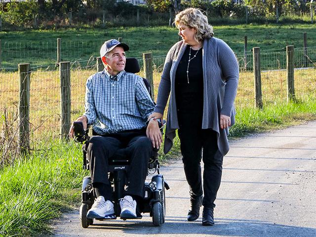 In a wheelchair for nearly a decade, Aaron Reding hasn&#039;t let ALS prevent him from managing the farming operation. (Des Keller)