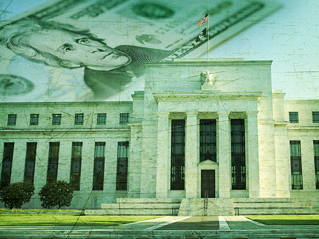 The Federal Reserve signals it may soon cut back on bond purchases. (Willard, Getty Images)