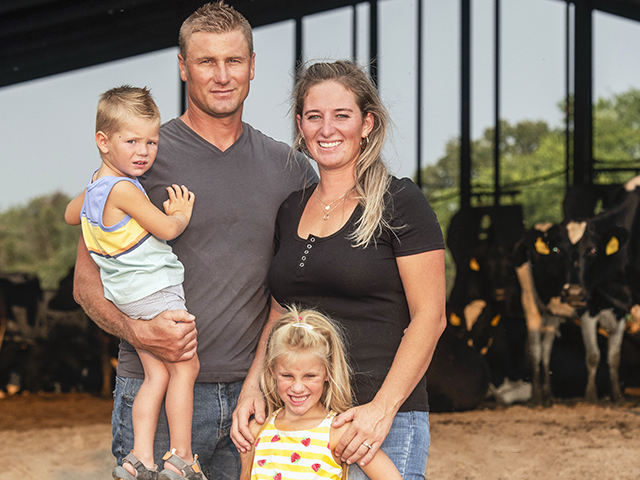 William and Astrid Osinga with their family focus their farm on milk production. (Joel Reichenberger)