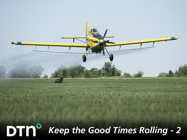 A crop duster sprays a wheat field near Great Bend, Kansas, in June of 2019. Agronomy and crop input retailers say farmers will likely spend more on nutrient and crop protection products this year, many of which will be applied by crop dusters. (DTN photo by Joel Reichenberger)