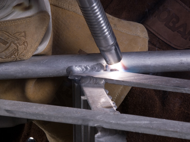 It is best to close the gap in broken aluminum as much as possible before welding. Push the gun away from the weld. (DTN photo)