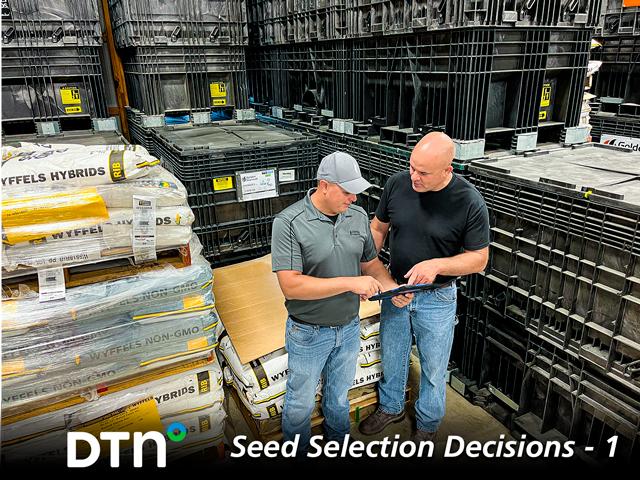 Brian Buford (left) provides value and service beyond just seed recommendations for farmers like Kevin Ross. (DTN/Progressive Farmer photo by Gregg Hillyer)