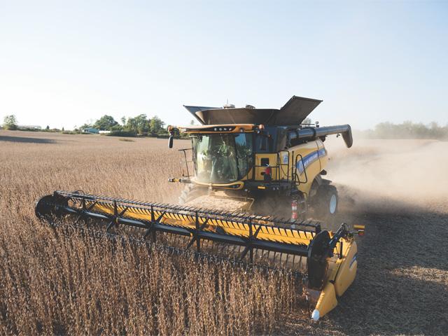 Equipment sales remain strong early in 2022. But manufacturers confront strong headwinds -- inflation, workforce issues, supply chain disruptions and war in Ukraine. (Photo courtesy of New Holland)