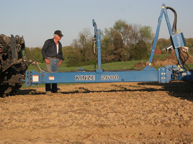 Adjust the planter tongue and drawbar to level or slightly higher in front to keep parallel linkages and closing wheels operating most efficiently. Field leveling is the first step to planter set-up and provides a good time to inspect tires and tire pressure for side-to-side leveling. (DTN photo)